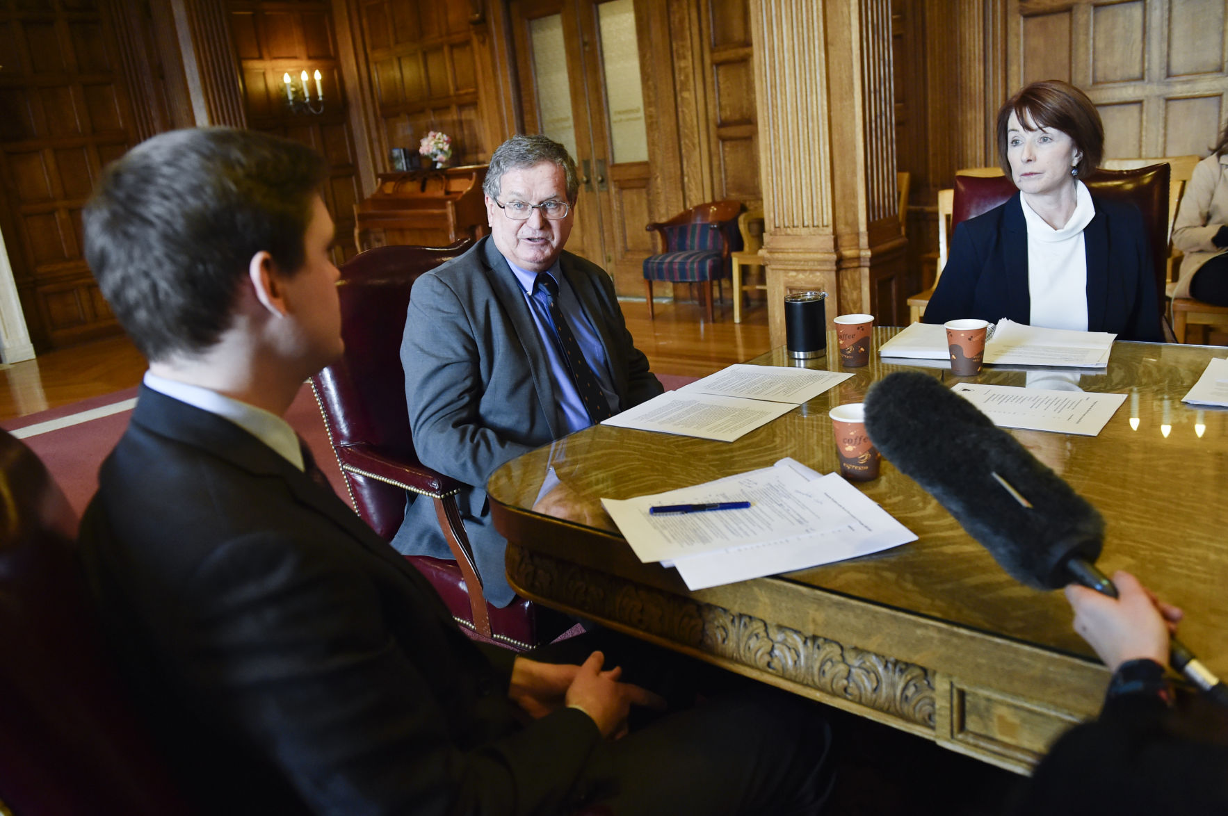 From left, Raph Graybill, lead counsel for the governor's Office, Tom Livers, budget director, Sheila Hogan, DPHHS director,